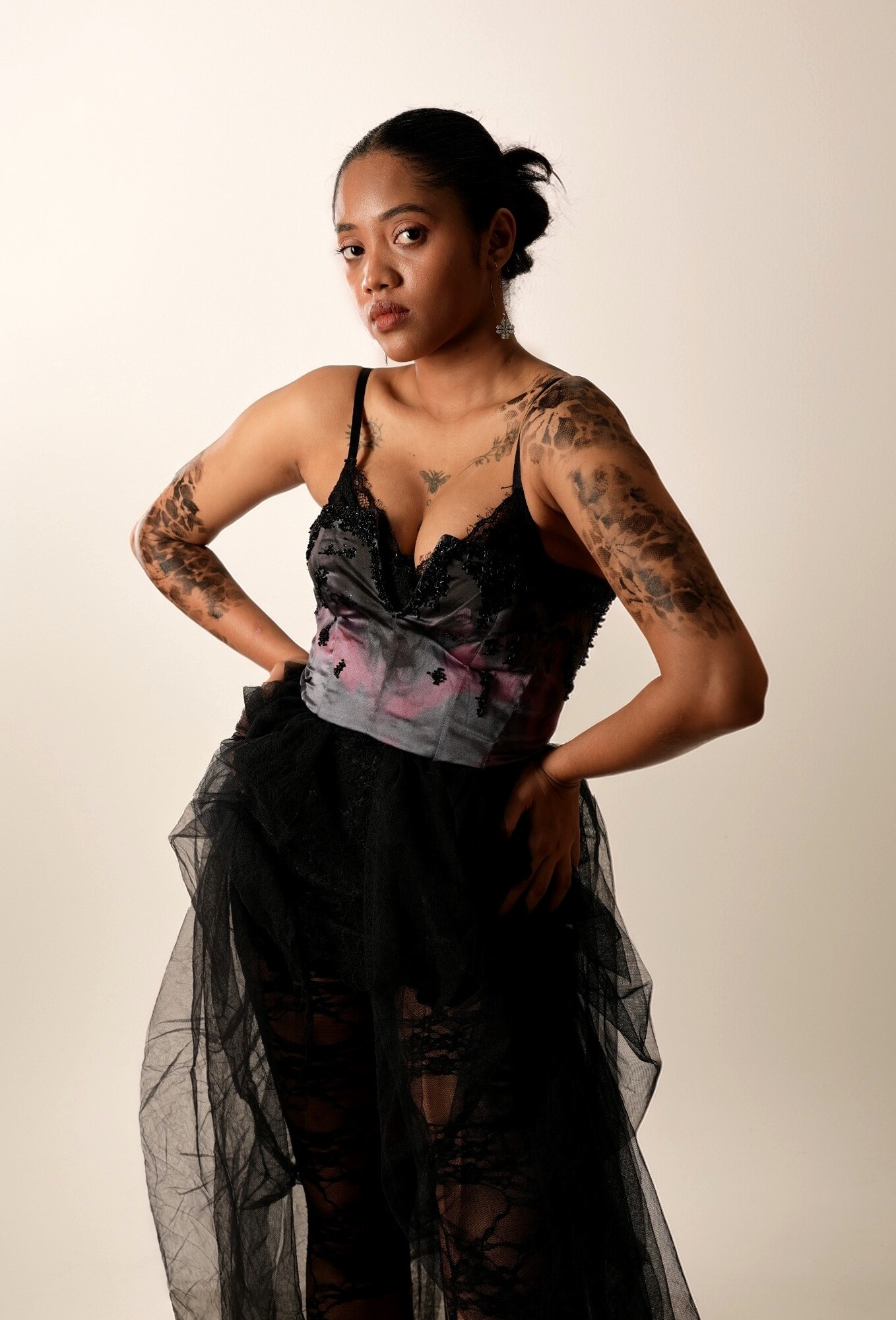 Model in a sculptural black tulle look from the Soft Armor editorial